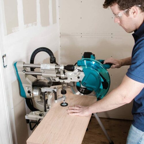 Makita LS1019L 10" Dual‑Bevel Sliding Compound Miter Saw with Laser in action